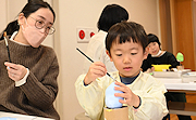 記事「上り調子の1年に！辰の張り子に絵付け」の画像