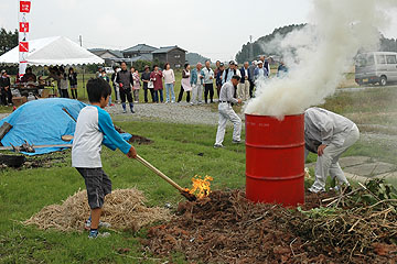 「たいまつで点火」の画像
