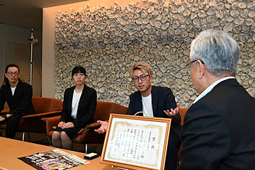 「実行委員会の総隊長・小川卓さん」の画像
