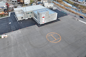 「新庁舎は栃尾防災ヘリポートの隣」の画像